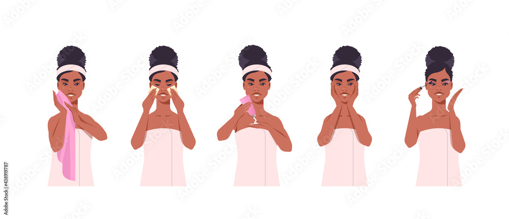 set young woman applying face mask dressed in towel african american girl cleaning and care her face skincare spa makeup facial treatment concept portrait horizontal