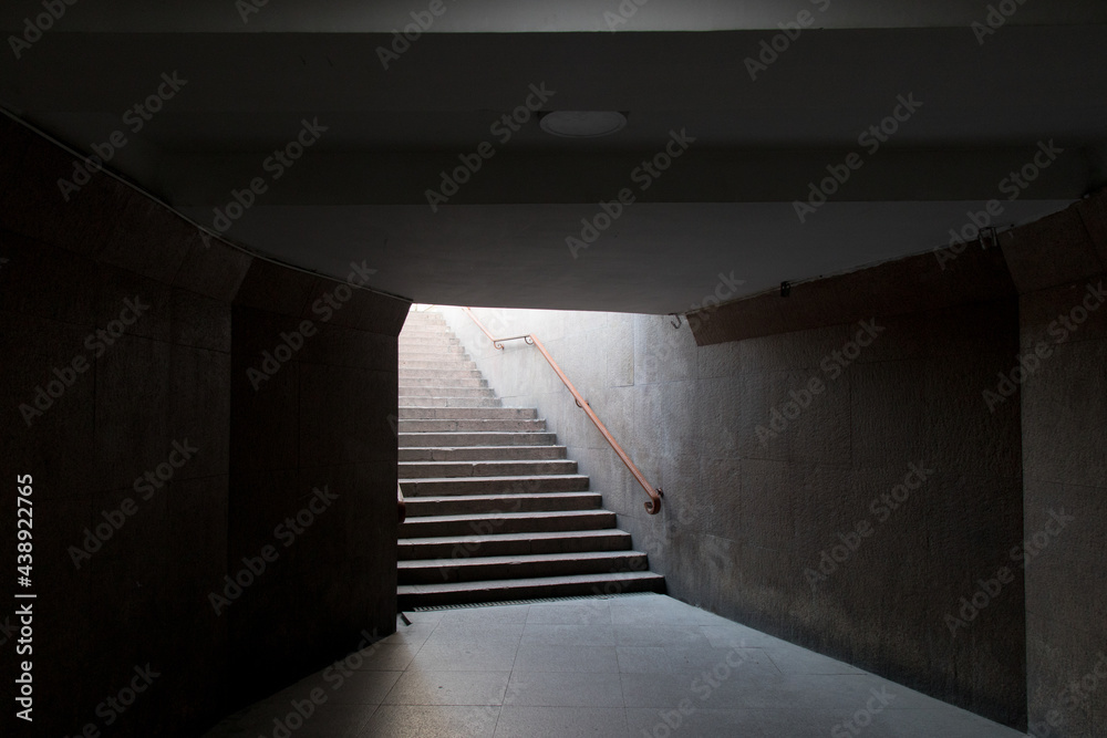 Underground pedestrian crossing. View from stairs exiting from a tunnel. Way out Underground pedestrian crossing. View from stairs exiting from a tunnel. Way out