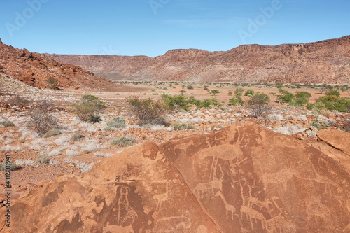 Prehistoric rock paintings, Twyfelfontein, Damaraland, Namibia photo