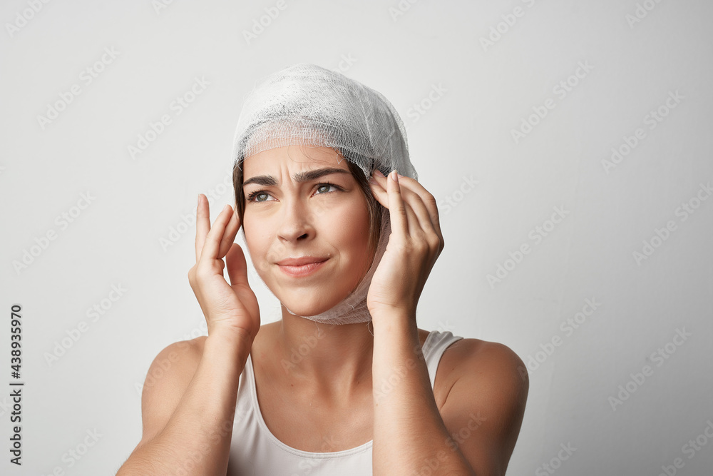 woman with head injury health problems discontent bandage