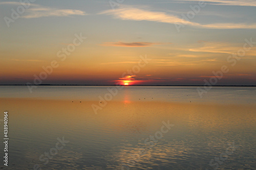 Fototapeta Naklejka Na Ścianę i Meble -  Wadden Sea: Sunset over Langeoog Island with rising tide