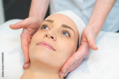 process of massage and facials in beauty salon photo