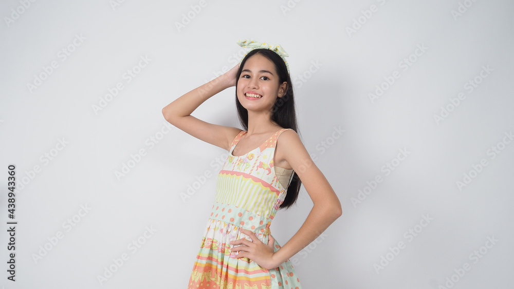 Asian Young woman gesture posing on white background. represent cheerful and confident. Showing gestures such as mini heart Okay Thumb up or point out. Happy amazed excited and surprised. Asian Young woman gesture posing on white background. represent cheerful and confident. Showing gestures such as mini heart Okay Thumb up or point out. Happy amazed excited and surprised.