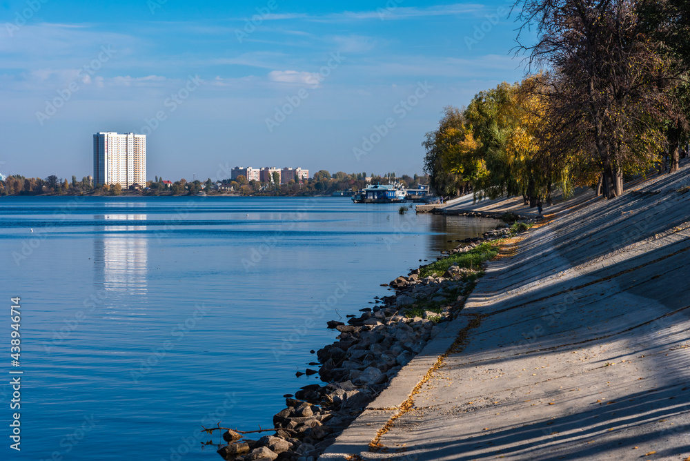 Embankment of the Russian provincial town of Engels. Volga river - autumn city landscape.