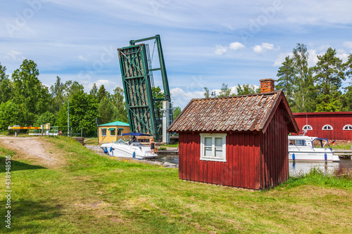 Göta Canal in sweden with boats at a open bascule bridge