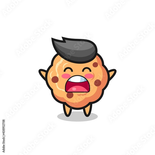 cute chocolate chip cookie mascot with a yawn expression