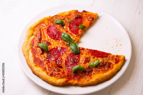 Pizza with salami. Traditional italian recipe.
