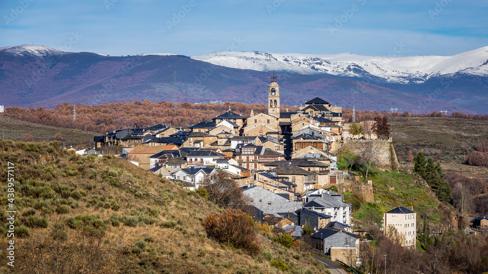 View of the village of Puebla de Sanabria (Zamora) and snow covered mountains.