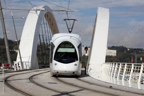 Tramway on a bridge near Confluence in Lyon, France photo