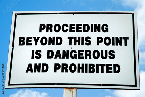 The Warning Sign On Half Moon Cay Island Beach