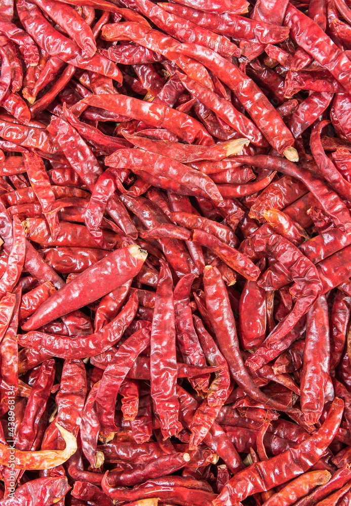 Background image of dried red hot chili pepper