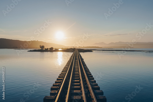 Fototapeta Naklejka Na Ścianę i Meble -  Sunset at the Sedgefield Train bridge