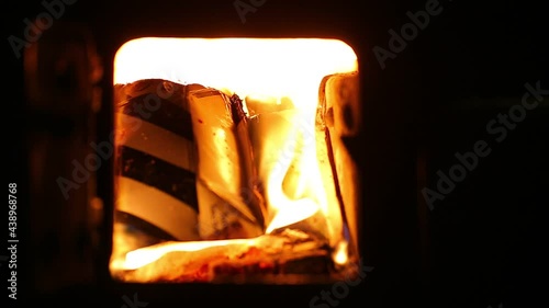 Time lapse of burning waste in a stove