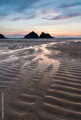 Absolutely beautiful landscape images of Holywell Bay beach in Cornwall UK during golden hojur sunset in Spring © veneratio