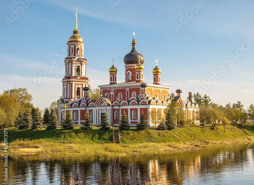 Magnificent old Orthodox church on the banks of the river in the small Russian town of Staraya Russa 