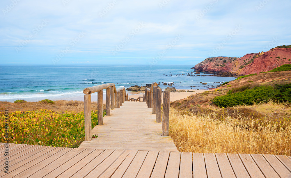 wooden boardwalk down to Amado Beach, surfer paradise, algarve Portugal
