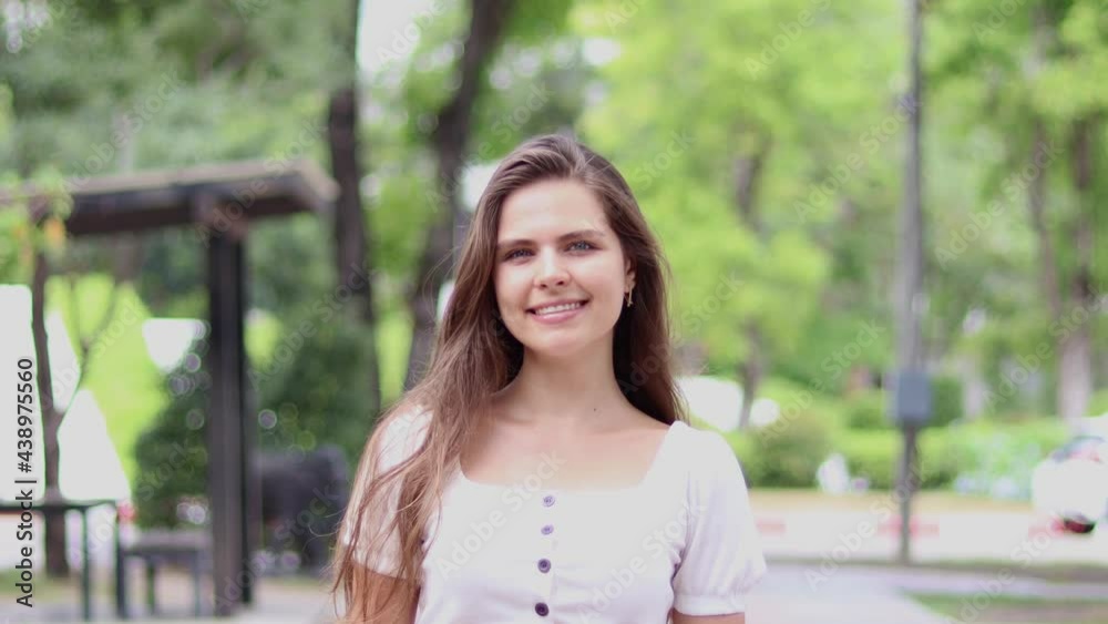 Close up of smiling girl looking at camera .fashion model face smiling. Portrait of joyful girl open eyes. Female nature beauty. Close up of smiling girl looking at camera .fashion model face smiling. Portrait of joyful girl open eyes. Female nature beauty.