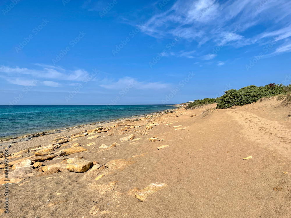 View of D'Ayala beach without people in Campomarino di Maruggio, Taranto, Puglia