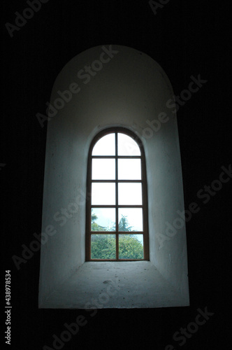 window of a medieval temple in Pitsunda. Black and white. They made an ancient temple. Abkhazia.