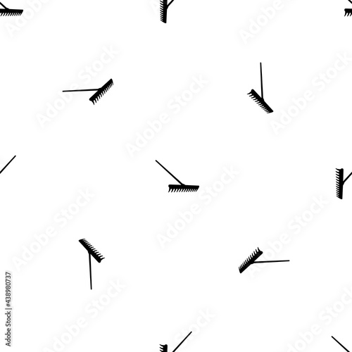 Seamless pattern of repeated black rake symbols. Elements are evenly spaced and some are rotated. Vector illustration on white background