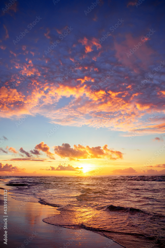 Fototapeta premium Sunset in beach of Brazil, sunrise in coastline of Salvador Bahia sand, sea and sun