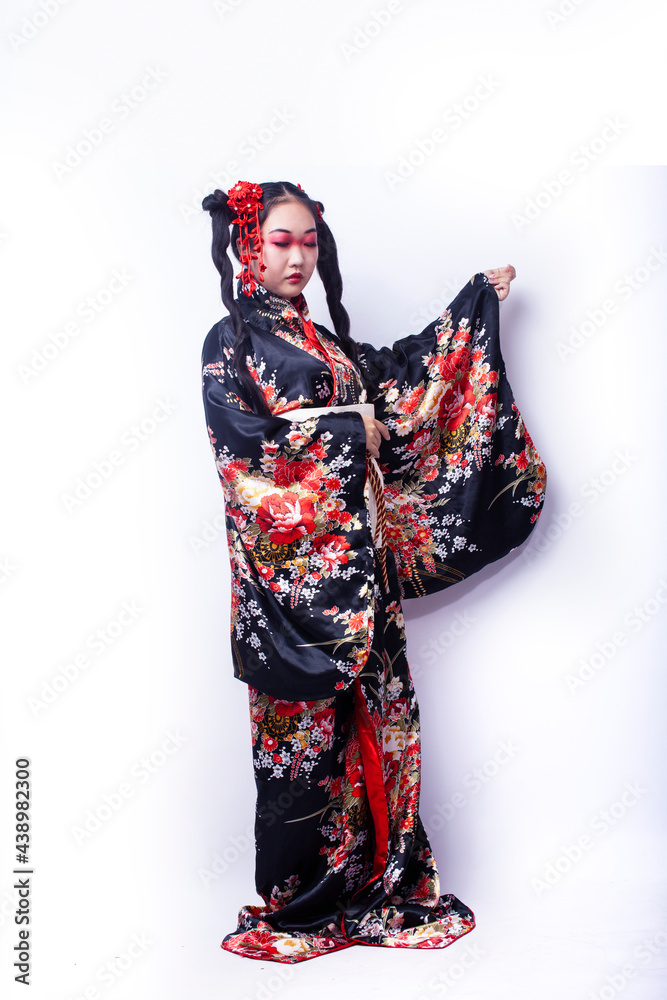 young pretty geisha in black kimono with sakura, asian ethno closeup on white background isolated young pretty geisha in black kimono with sakura, asian ethno closeup on white background isolated