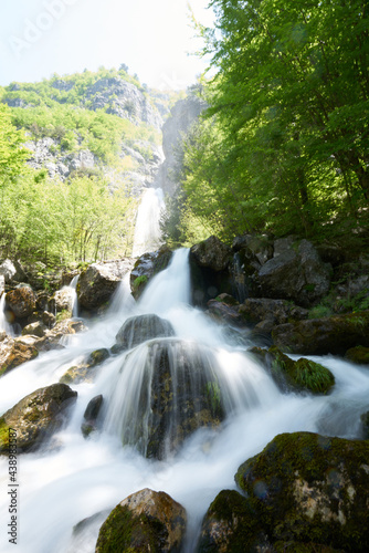 Waterfall in the mountains in Theth in the Albanian alps