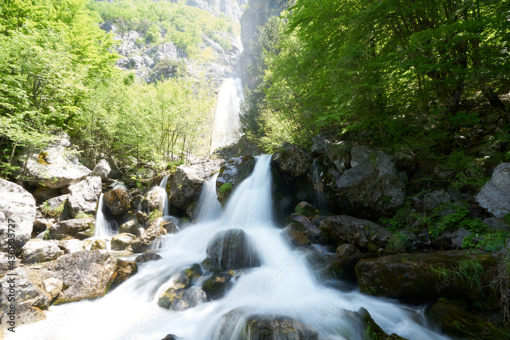 Obraz premium Waterfall in the mountains in Theth in the Albanian alps
