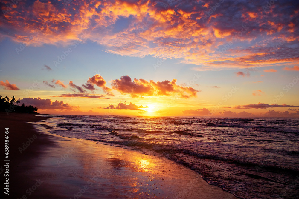 Sunset in beach of Brazil, sunrise in coastline of Salvador Bahia sand, sea and sun