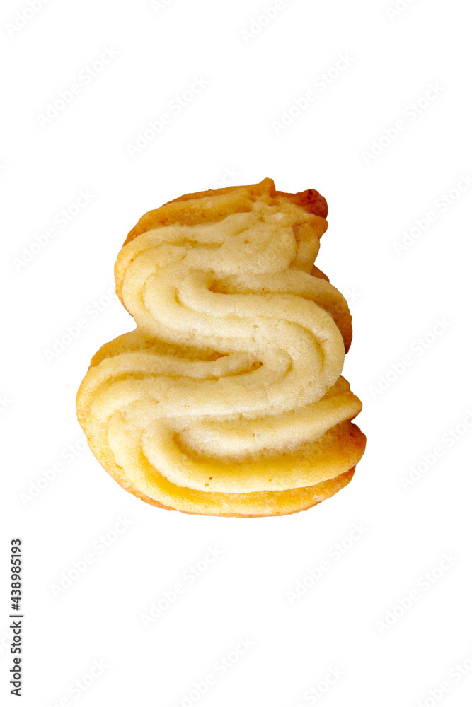 curly vanilla cookies on a white plate, homemade pastries curly vanilla cookies on a white plate, homemade pastries