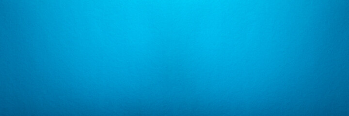 Blue background. Panorama texture blue cardboard seamless pattern. Large format photo for print or banner.