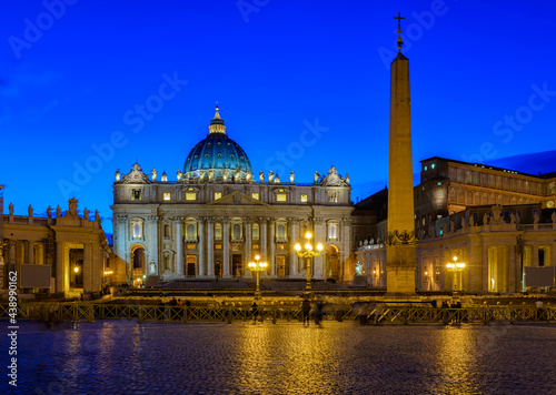 Papal Basilica of Saint Peter and St. Peter's Square in Vatican at night, Rome, Italy. Architecture and landmark of Rome. Postcard of Rome