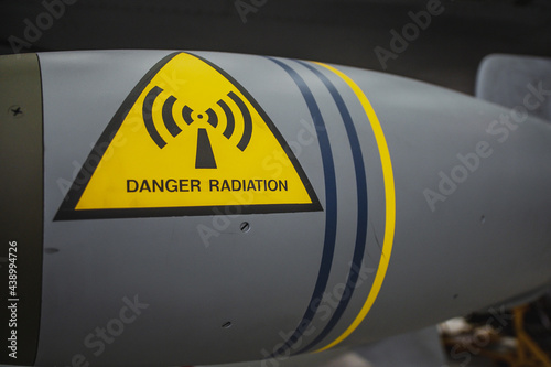 Duxford England May 2021 Danger Radiation sign on a bomb of a fighter jet airplane, most likely containing depleted uranium