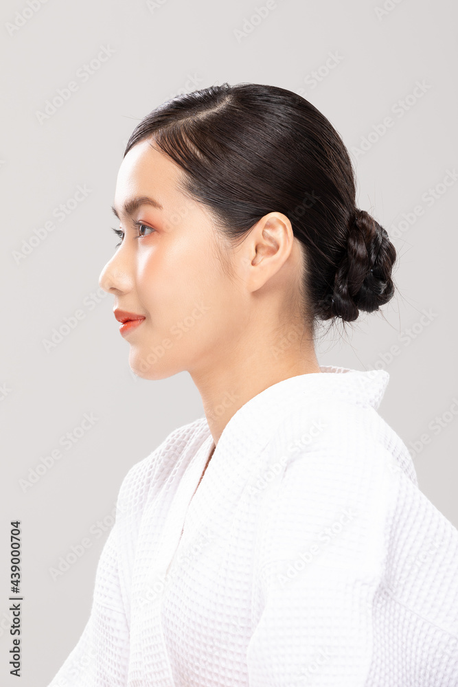 side view Wellness Asian young woman smile with beautiful nose on facial face side view Wellness Asian young woman smile with beautiful nose on facial face