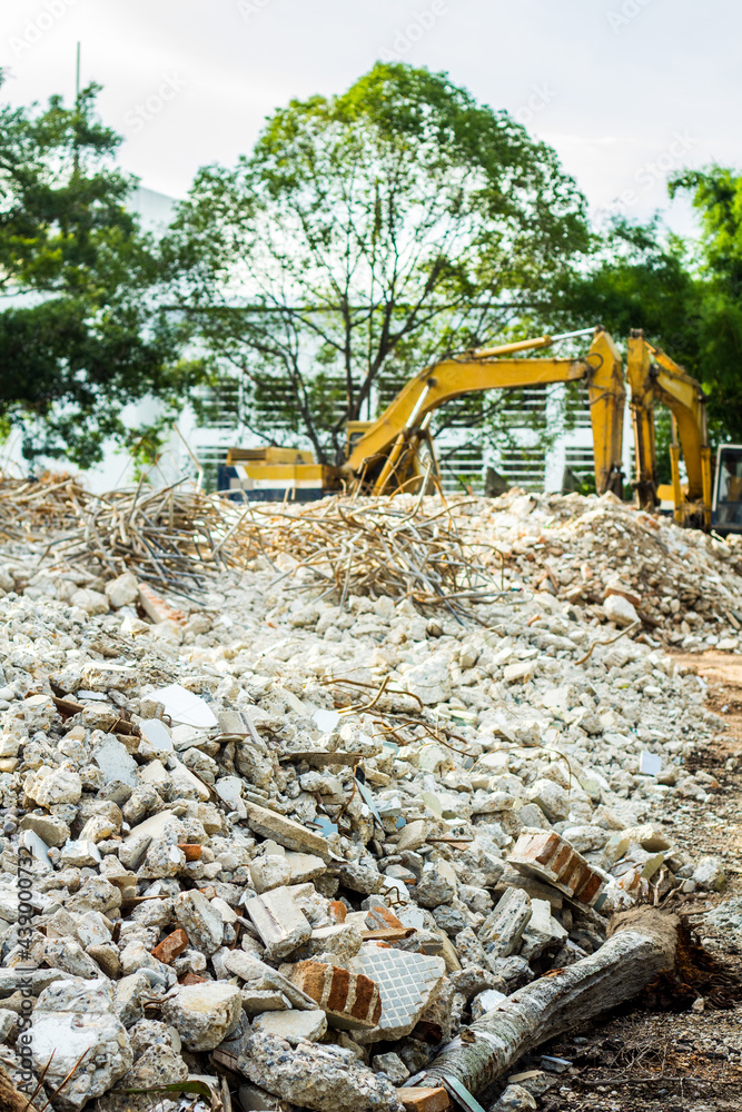 backhoe concrete stone breaker at construction site backhoe concrete stone breaker at construction site