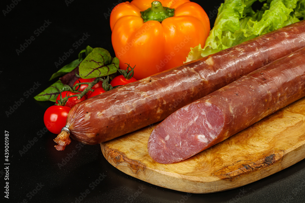 Pork ham sausage cut isolated