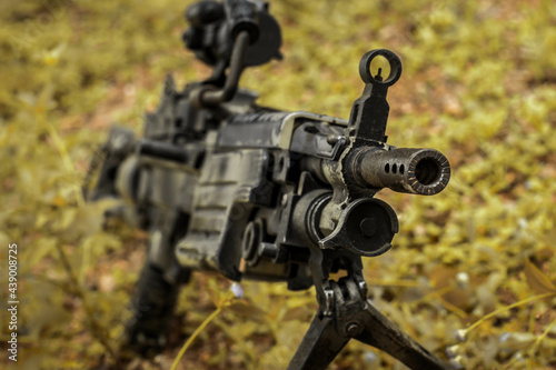 M249 light machine gun with 7.62 mm cartridge belt