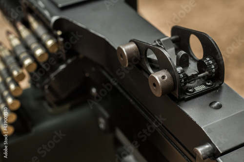 M249 light machine gun with 7.62 mm cartridge belt black and white