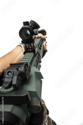 POV of M4 rifle weapon shooting gun with red dot isolated on white background