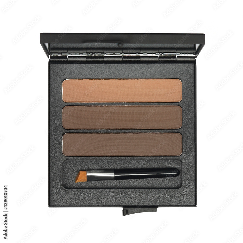 Open cosmetic set with eye shadows and applicator in black plastic case