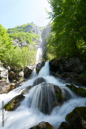 beautiful waterfall in the hiking destination theth in the albanian alps