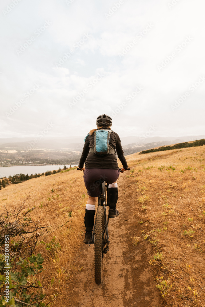 Female on a mountain bike