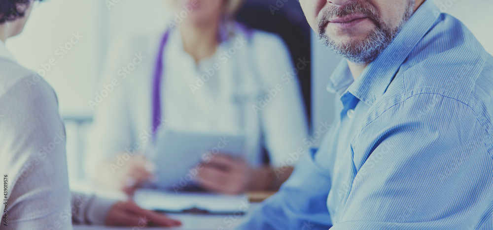 American doctor talking to woman in surgery American doctor talking to woman in surgery