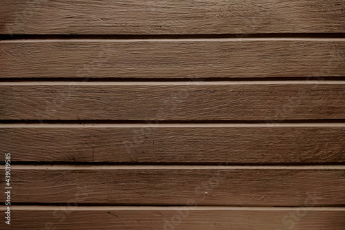 Dark wood panel texture.