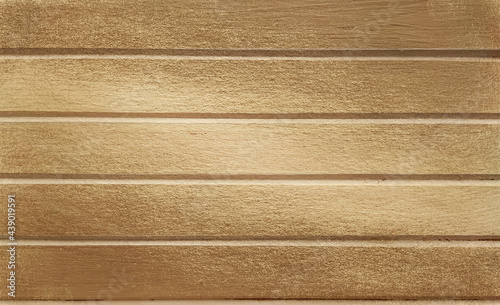 Golden background with wooden stripes.