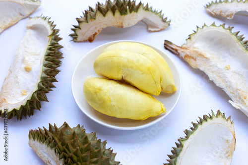 Durian with peel on white background.
