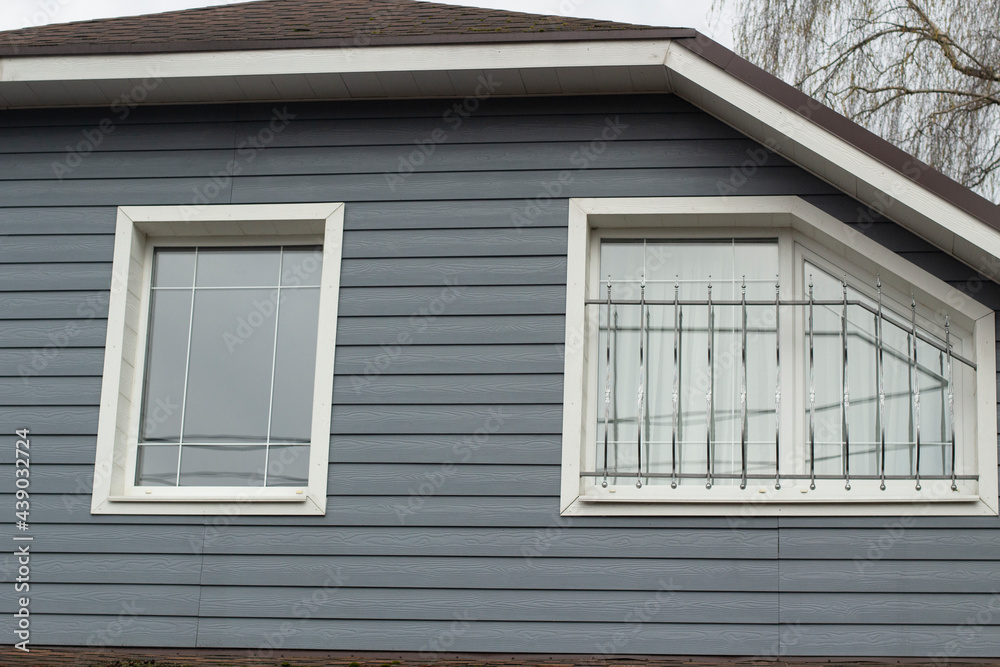 Country house outside the city. Residential building windows. Country house outside the city. Residential building windows.