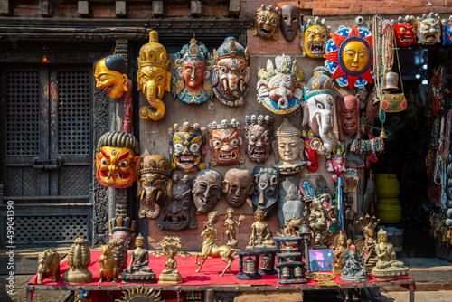 Wooden masks and handicrafts on sale at local shop in the Thamel market, Thamel District of Kathmandu, Nepal.  photo