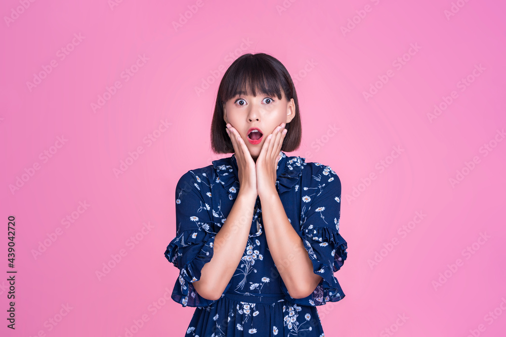 Asian attractive cute short hair woman happy face shocked surprised amaze unexpected confident independent strong mother businesswoman wearing casual dress pink isolated background in studio portrait Asian attractive cute short hair woman happy face shocked surprised amaze unexpected confident independent strong mother businesswoman wearing casual dress pink isolated background in studio portrait