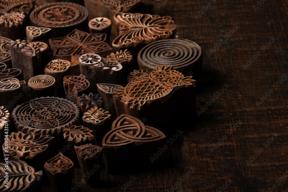 .Mixed traditional Indian wood block pattern for textile printing on rustic wood background. Block Printing,Rajasthan India Block Printing, Wood block used for handmade textile printing,Hand craft .Mixed traditional Indian wood block pattern for textile printing on rustic wood background. Block Printing,Rajasthan India Block Printing, Wood block used for handmade textile printing,Hand craft